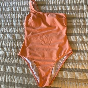 One piece bathing suit. One shoulder